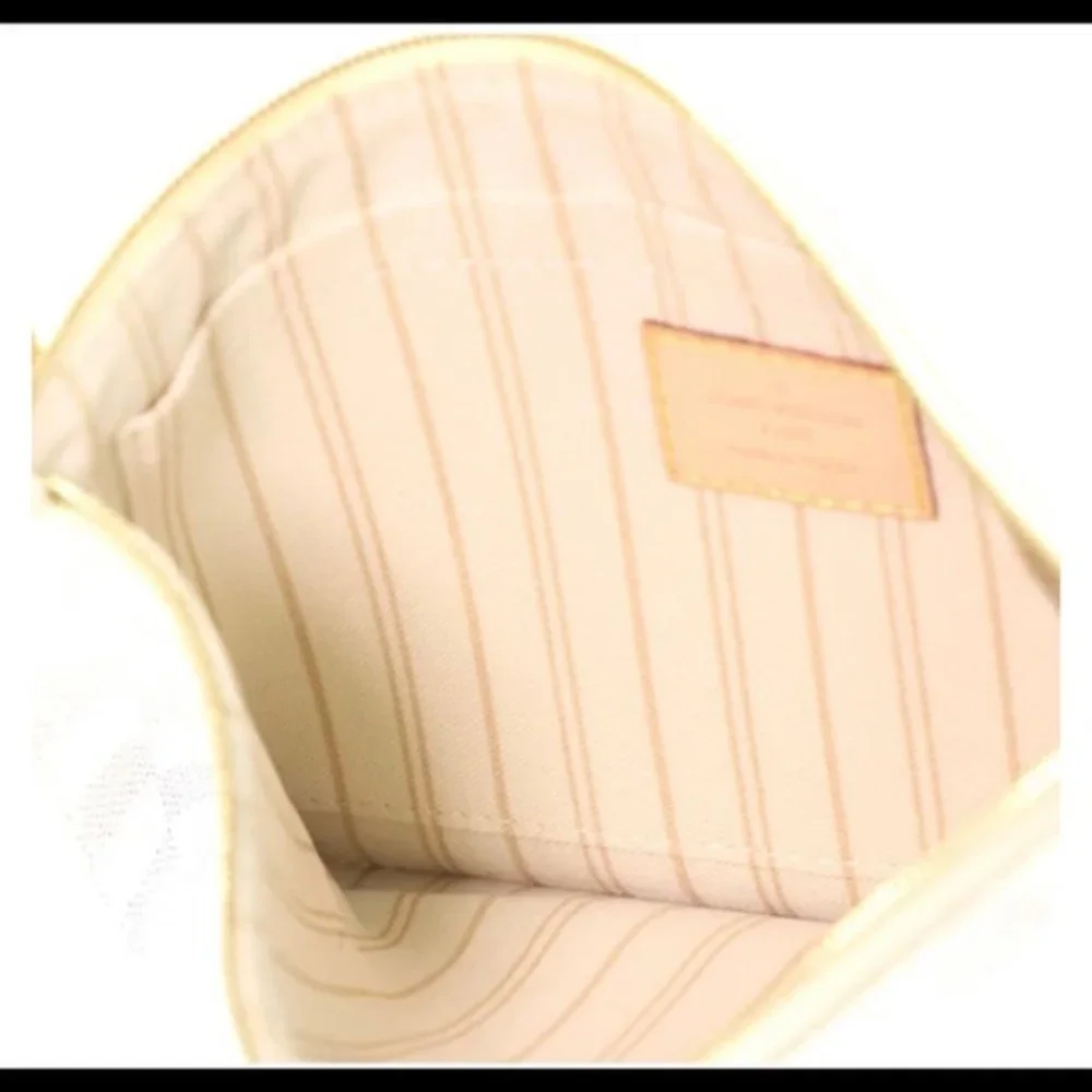 Auth NEW Louis Vuitton Azur neverfull wristlet GM beige interior